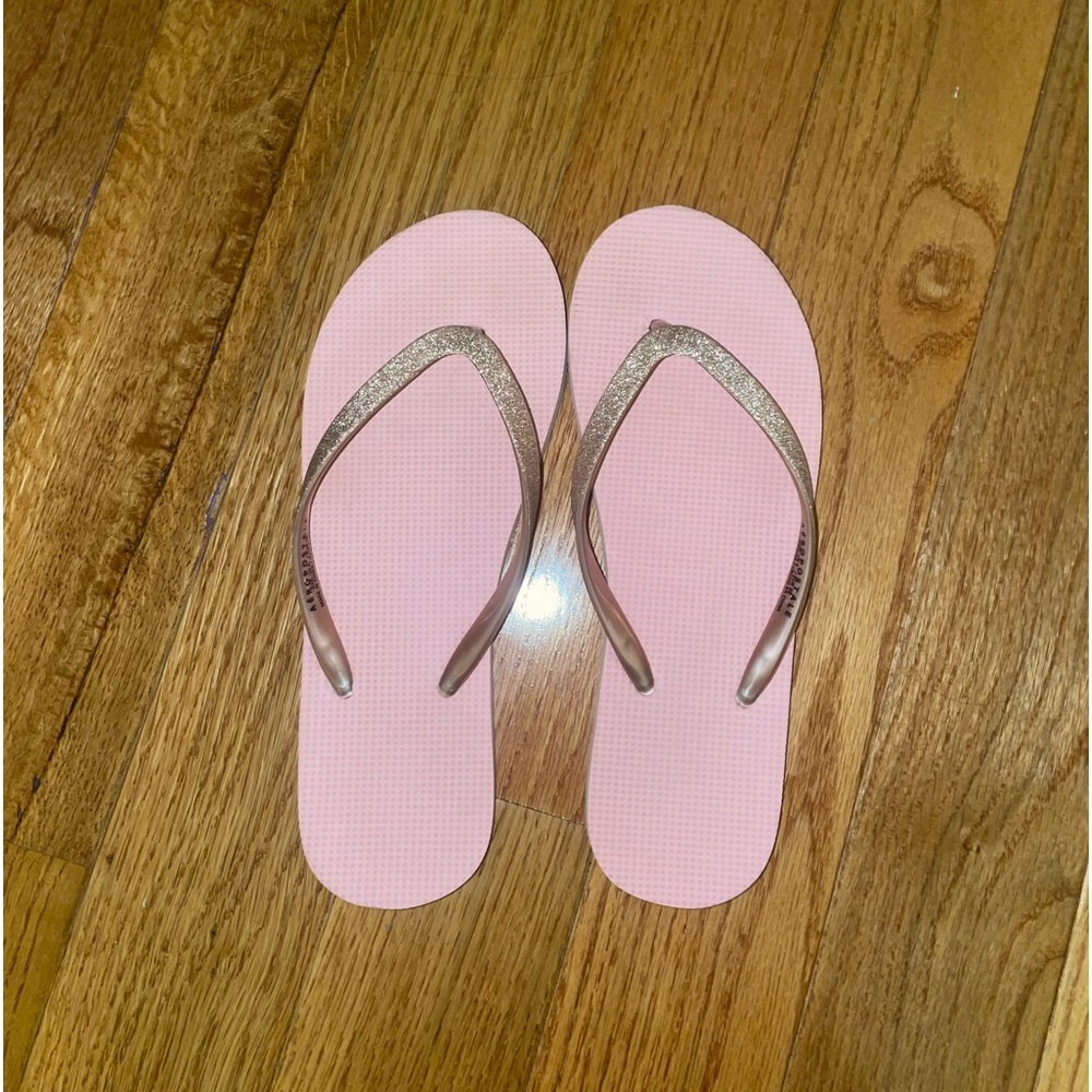 Pink flip flops with glitter strap
